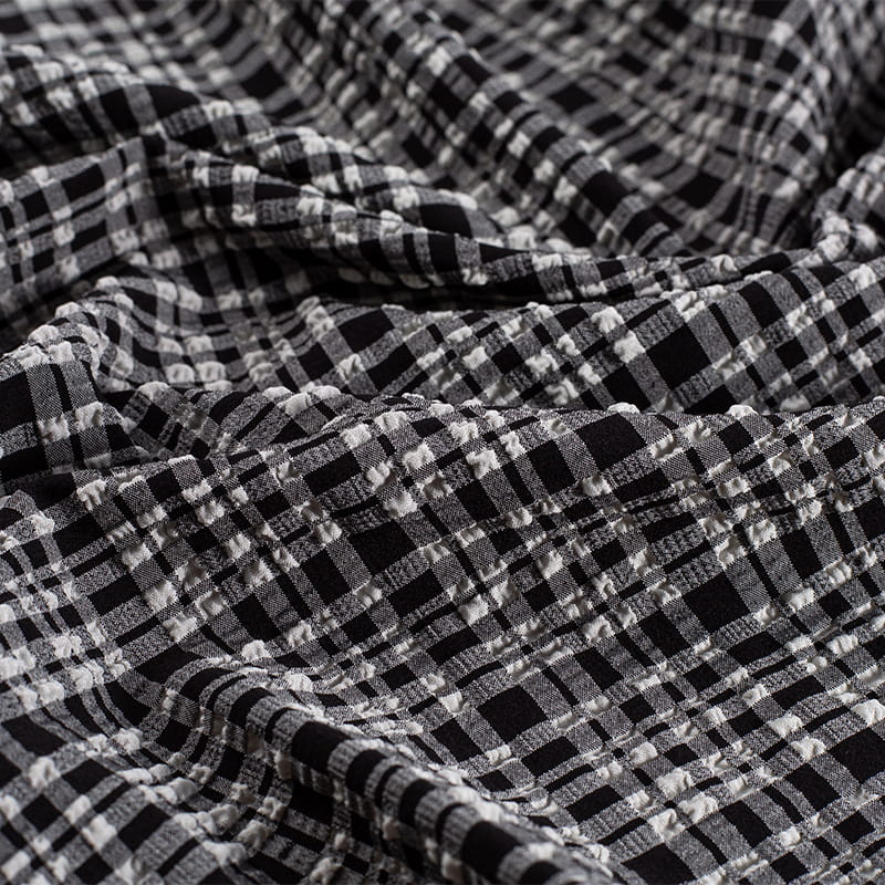 Tela Jacquard de burbujas de moda de nailon y poliéster blanco y negro de 130gsm